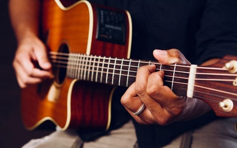 man playing guitar