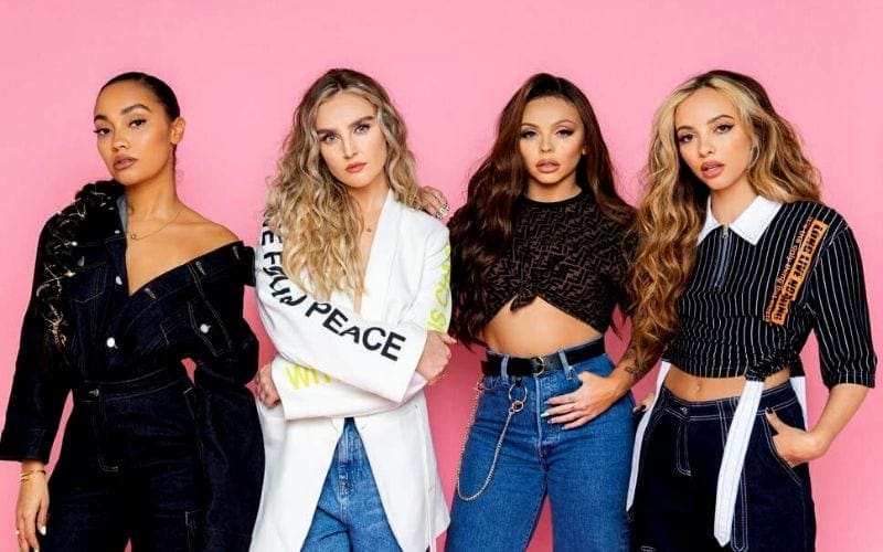 Little mix in front of pink wall for Capital Radio