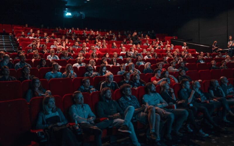 how do movie theaters make money