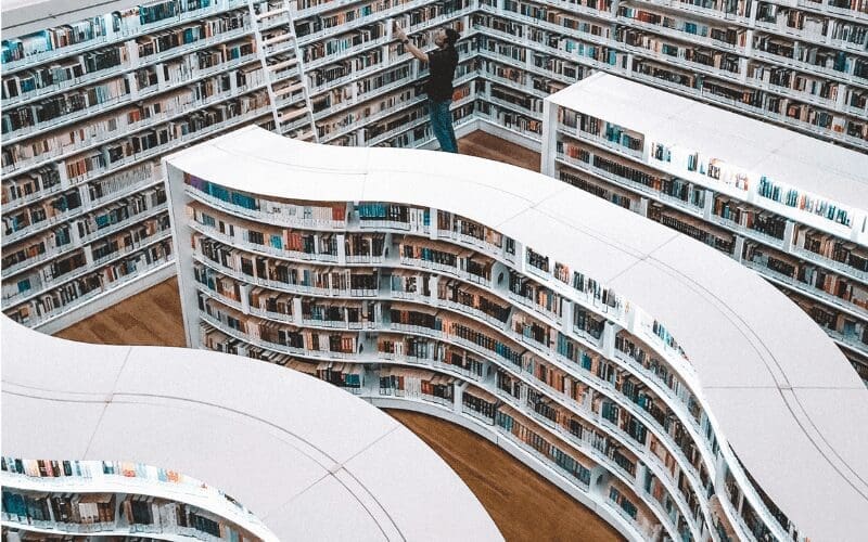 Man searching a vast library