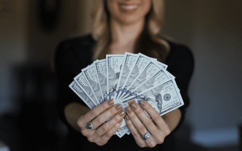 woman holding money