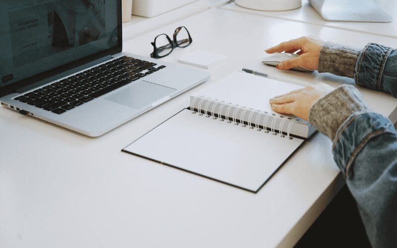 production coordinator working at computer