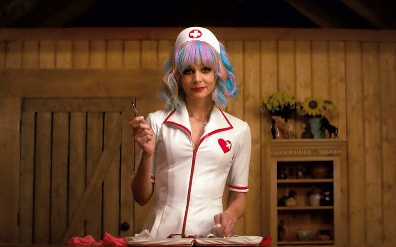 Cassie from promising young woman in a pretend nurse outfit holding a scapel.