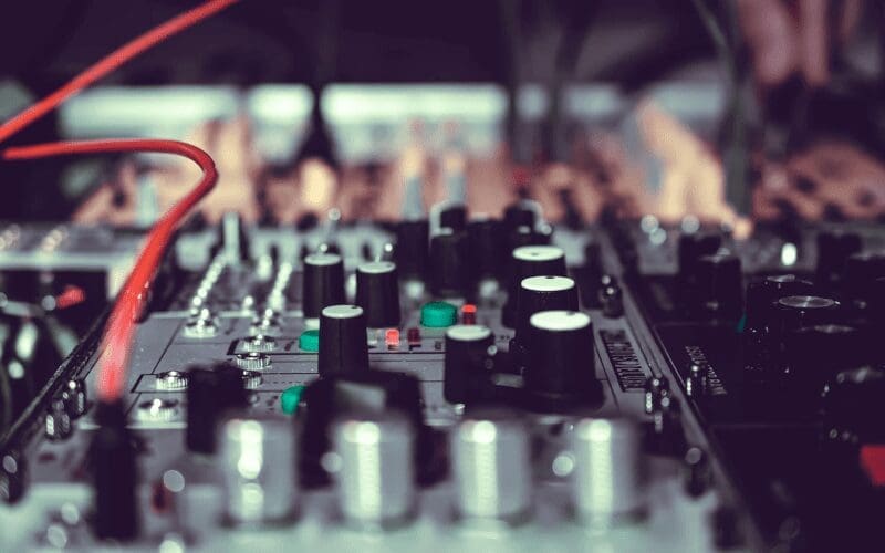 A grey mixing desk.