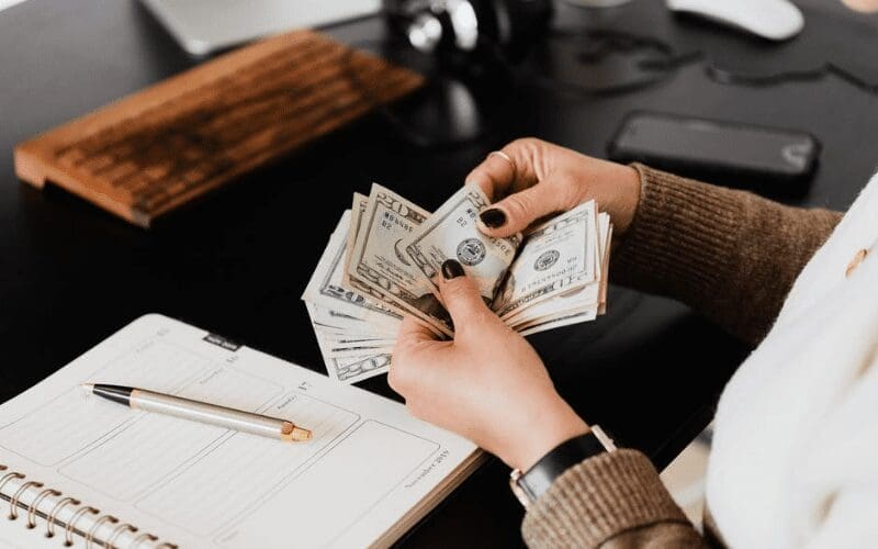person counting money