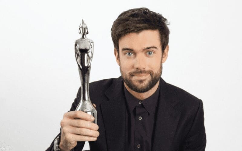 Jack Whitehall holding brit award BRIT Awards 2021