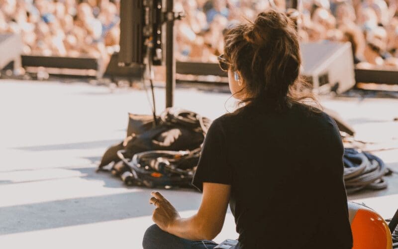 tour manager backstage at a gig