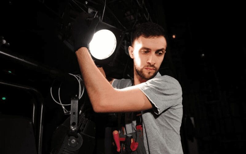 key grip on set with lighting