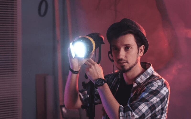 key grip holding a light