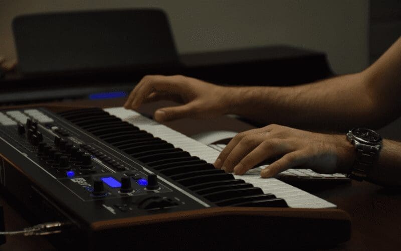 someone playing a keyboard