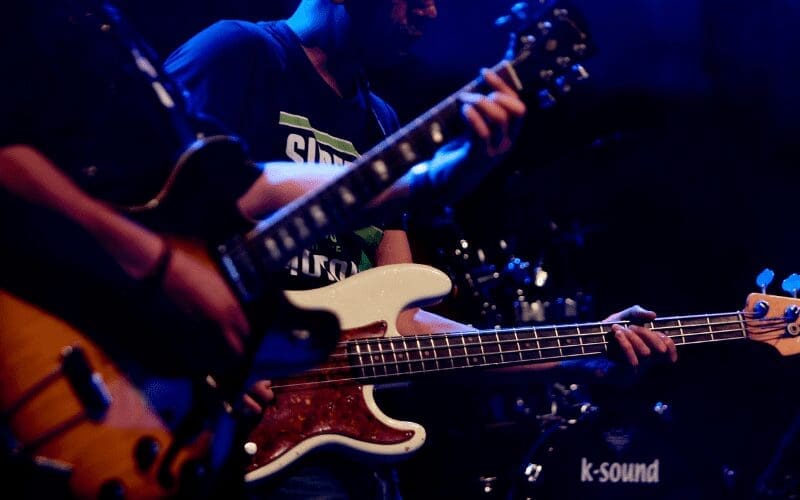 music band playing guitars