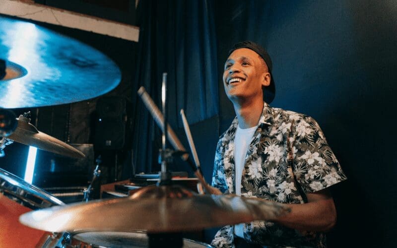 man playing drums 