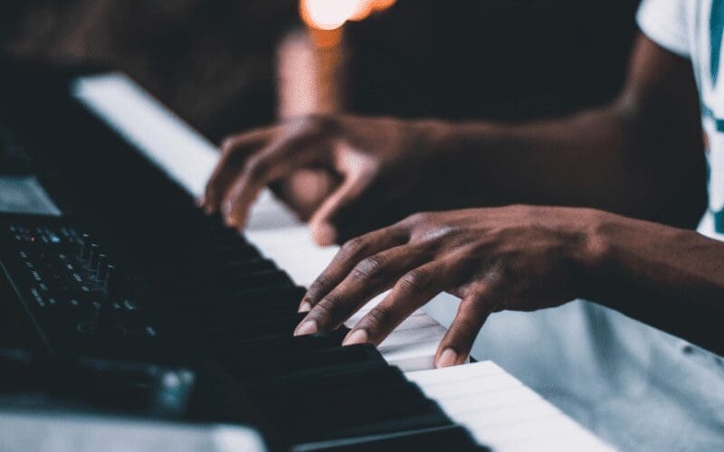person playing keyboard
