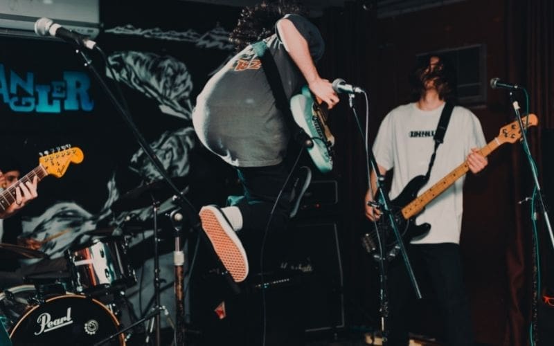Live shows, as displayed in the image, are an important part of the wider rock subculture.