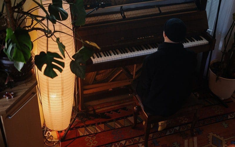 man playing piano