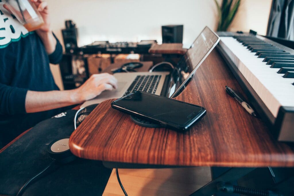 Woman using Songfinch on her personal laptop